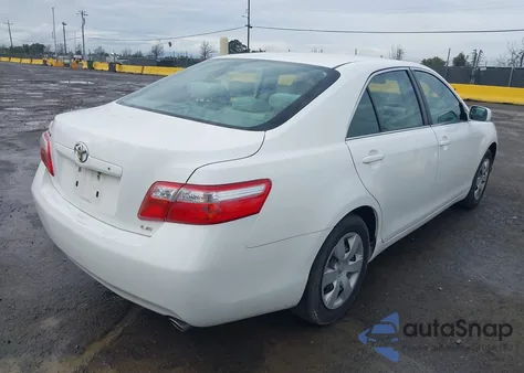 2009 Toyota Camry Le V6 z USA, uszkodzony, nr VIN JTNBK46K893046041